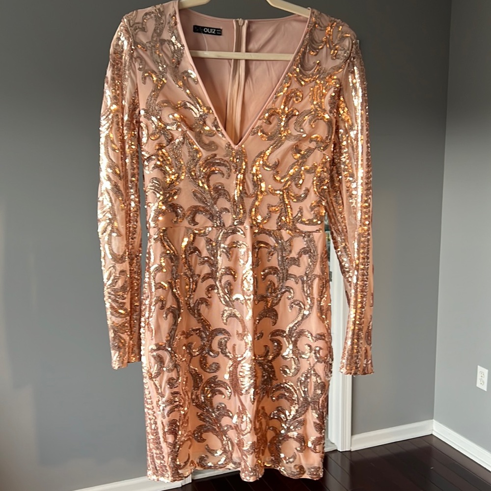 Quiz long sleeve sequins and sheer arms with sequins European size 40